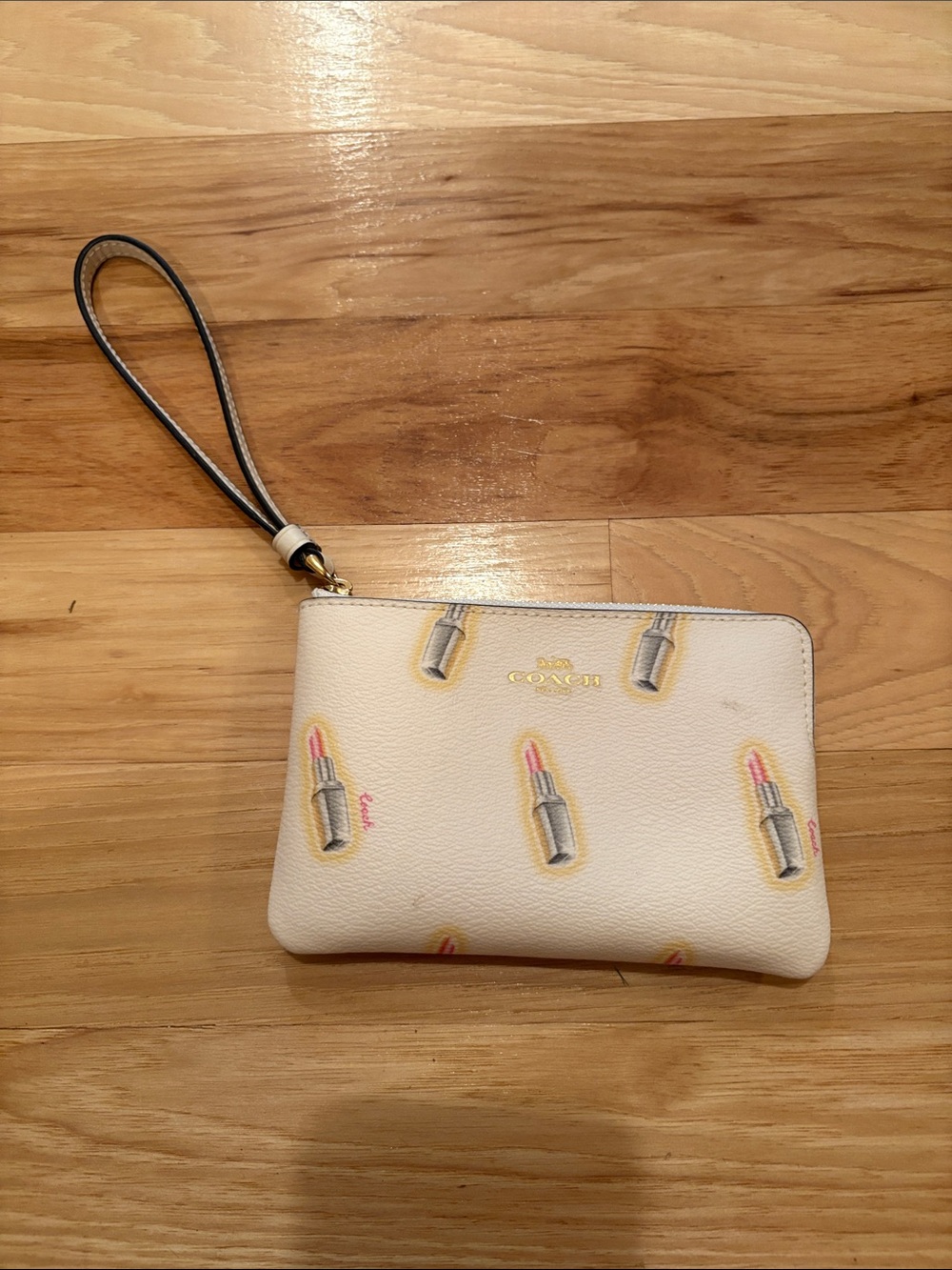 Coach Cream Leather Wristlet with Lipstick Motif